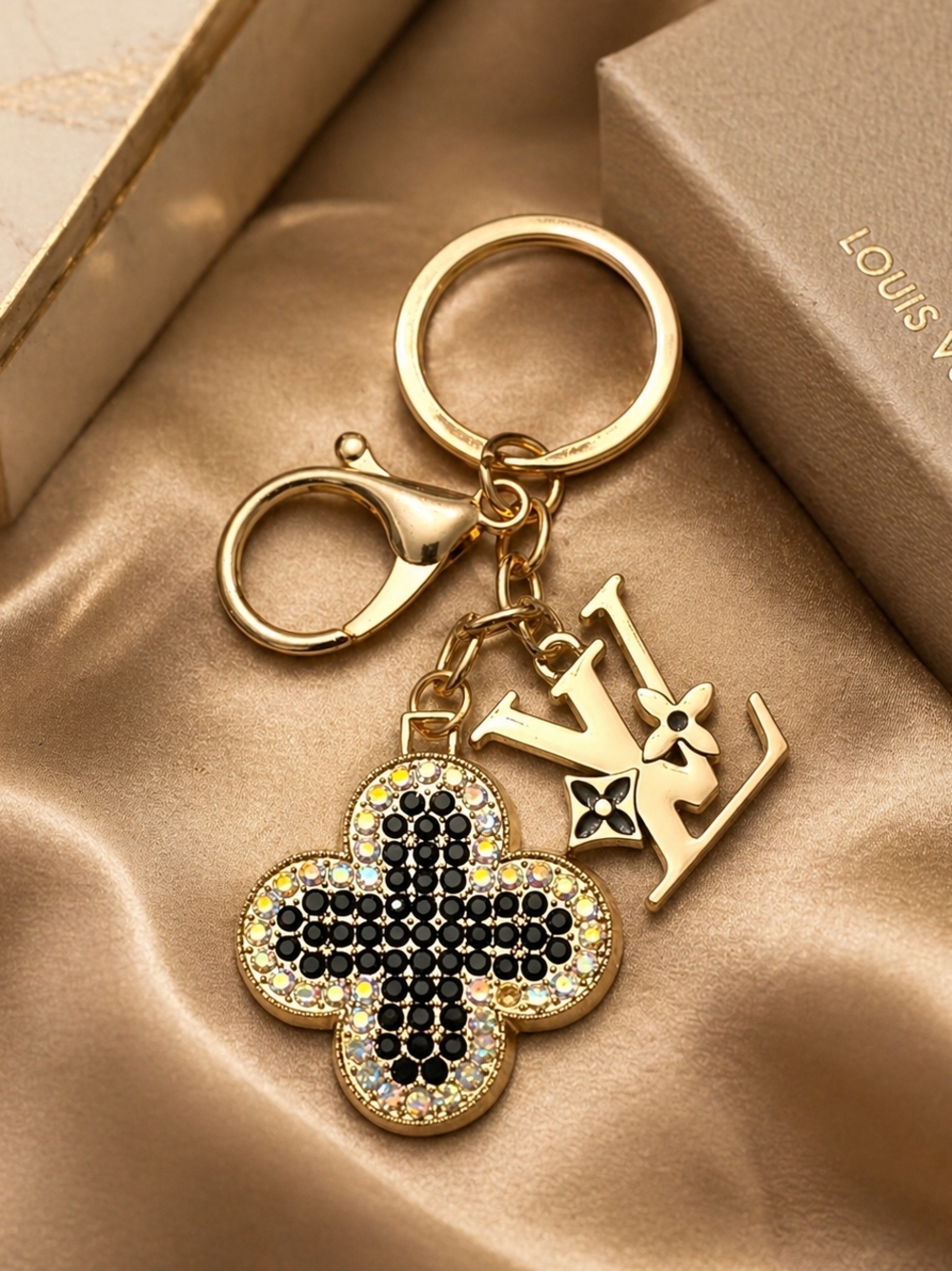 Louis Vuitton Gold-tone Fleur Keychain with Black Crystal Accents